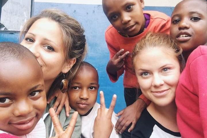 Volunteers with children at Fruitful Orphanage